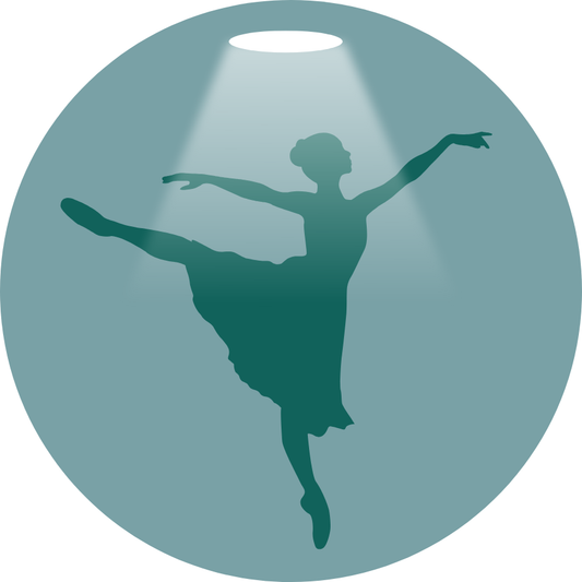 Teal ballerina in arabesque with white overhead spotlight and medium teal background.